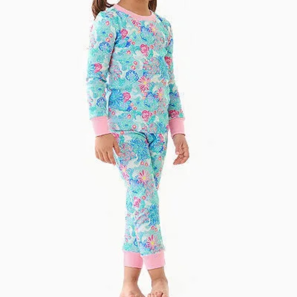 Lilly Pulitzer x Pottery Barn Kids pajama set in a floral unicorn pattern.